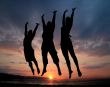 Three people jumping