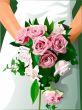 Bride holding wedding flowers