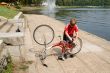 boy repairs the bicycle