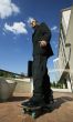 Punk Businessman on Skateboard