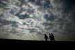 Walkers Against the Sky