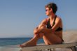 Woman relaxing on a beach