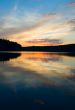 sunset over the lake and forest