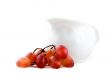 Purple grapes and white pot isolated on white