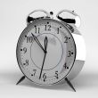 Metallic alarm clock on grey background