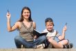 Family with book and pens