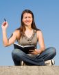 girl with writing-book and pen