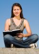 girl taking notes