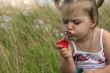 Baby with soap bubble