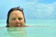 woman swimming in open ocean