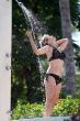 Woman in the outdoor shower