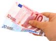 Hand holding euro notes - clipping path included