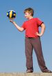 boy throws ball