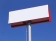 Blank billboard over blue sky