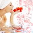 red petals and flowers in water #2