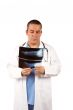 Male doctor examining x-ray