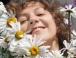Smiling Woman With Daisies