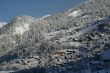 New snow on chalets in village