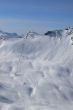 Cubere ski lift with ski tracks