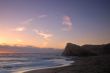 sunset by the ocean