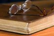 Glasses on Bible