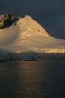Golden glacier and mountain sunset