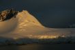 Golden glacier and mountain sunset