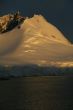 Golden glacier and mountain sunset