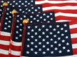Partial view of parade style U.S.A. flags