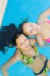 Two beautiul girls in a swimming pool