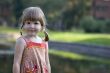 Pretty little girl in park