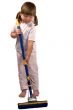 Upset little girl with mop