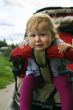 Funny babygirl in pram
