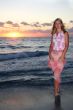 Beautiful blonde in sunrise lights