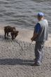 Russian man with pet bear on the street