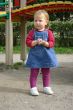 Toddler girl playing in patio