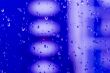 Abstract vivid blue background with waterdrops