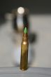 A bullet on a table