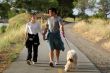 Couple walking their dog