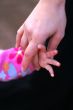 Child Girl and mother hands