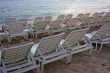 Chaise-longues in sunset