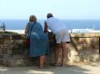 The man and the woman looking at the sea