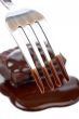 Fork and two chocolate cakes
