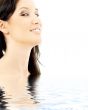 smiling brunette with diamond make-up in water
