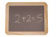 Chalkboard with 2+2 equals 5 written on it