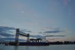 freighter passing under a drawbridge