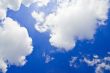 bright blue sky with fluffy white clouds