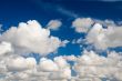 Cloudscape. White clouds in the blue sky.