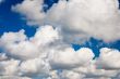 Cloudscape. White clouds in the blue sky.