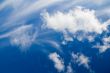 Cloudscape. White clouds in the blue sky.